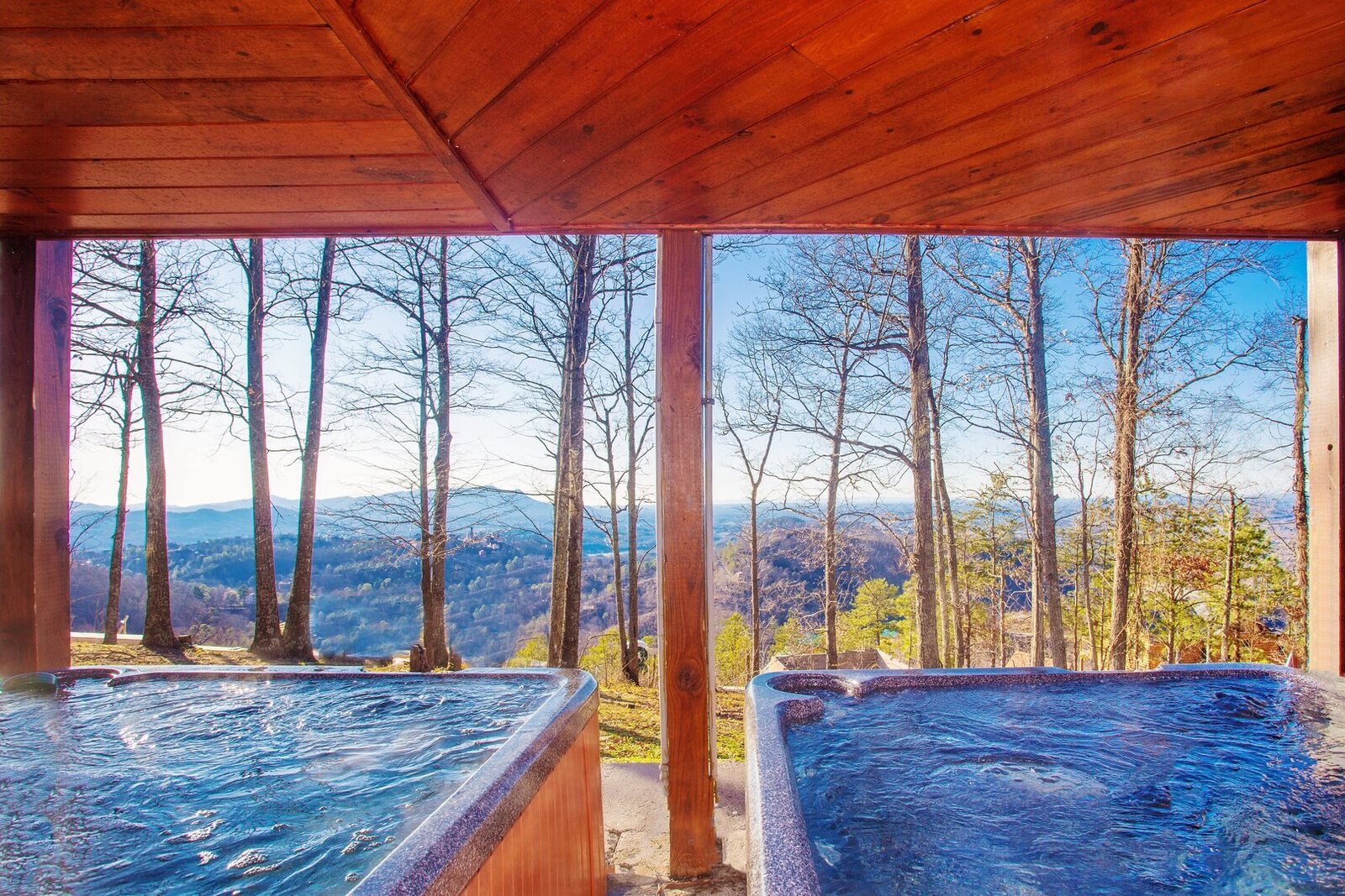 Twin hot tubs with long-range mountain views